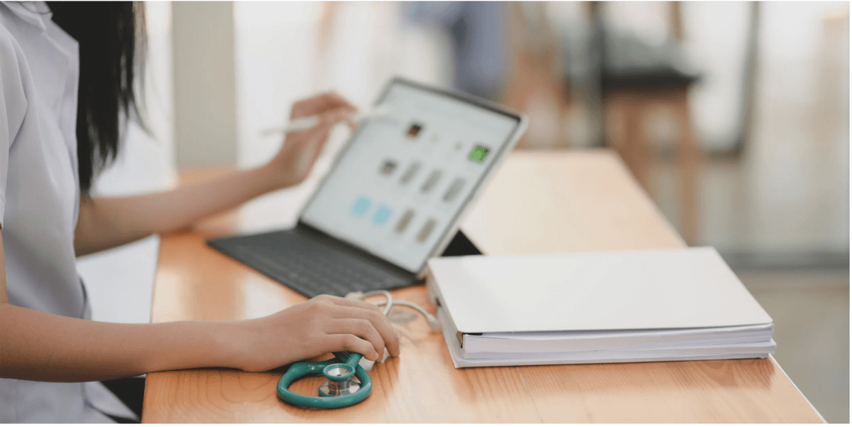 Healthcare professional at desk